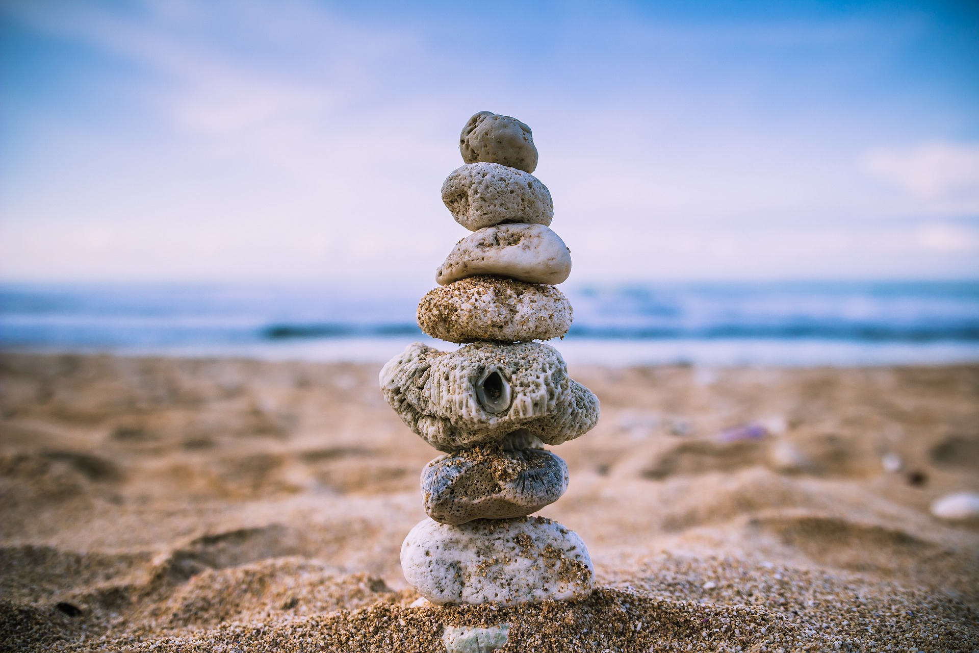 rocks balanced over each other in a vertical column